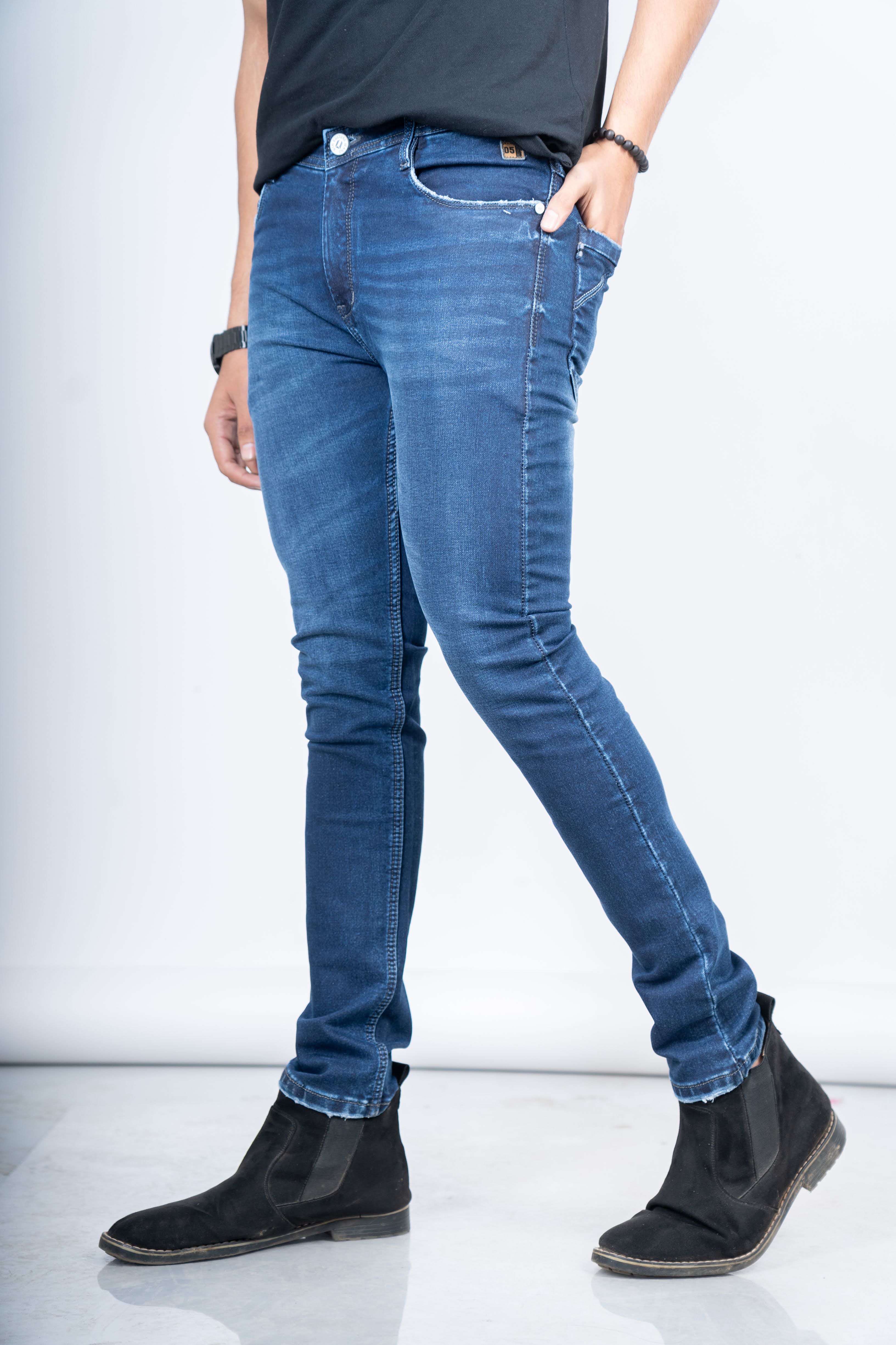 LIGHT INDIGO DISTRESSED SKINNY FIT JEANS